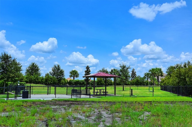 surrounding community featuring a gazebo and a lawn