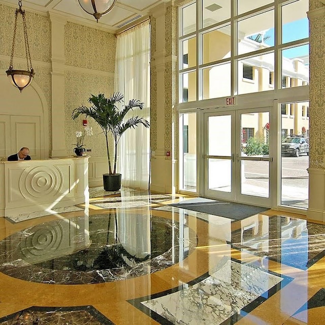 800 N Tamiami Trl Unit 307, Sarasota, FL 34236 - community lobby with a decorative wall and a towering ceiling