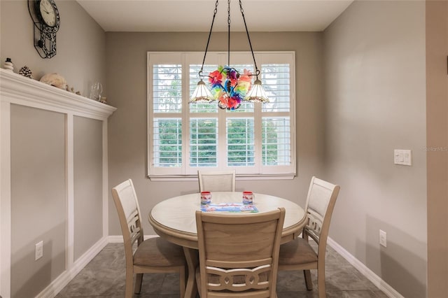 dining area featuring tile patterned floors