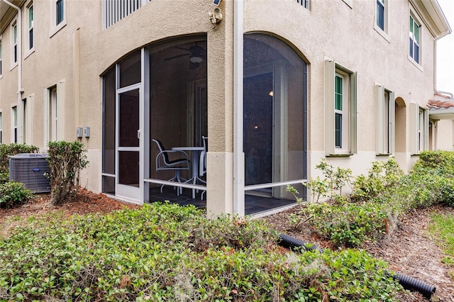 entrance to property featuring central AC unit