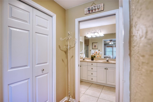 bathroom with vanity and tile patterned floors