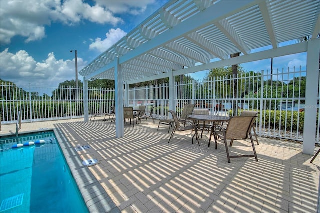 view of swimming pool with a pergola and a patio area