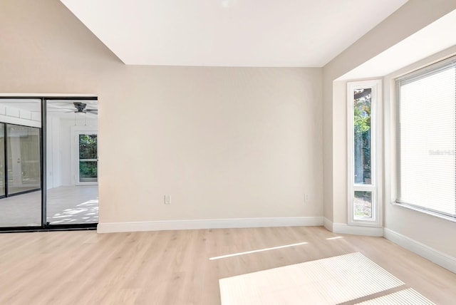 spare room featuring ceiling fan and light hardwood / wood-style floors