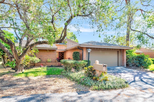 ranch-style home with a garage