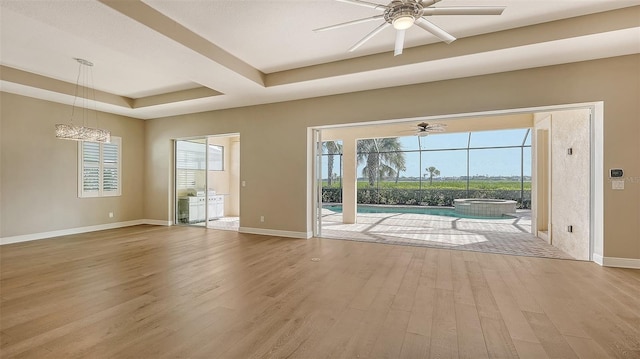 unfurnished room with ceiling fan and light wood-type flooring