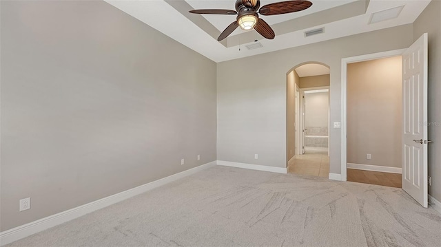 carpeted empty room with ceiling fan