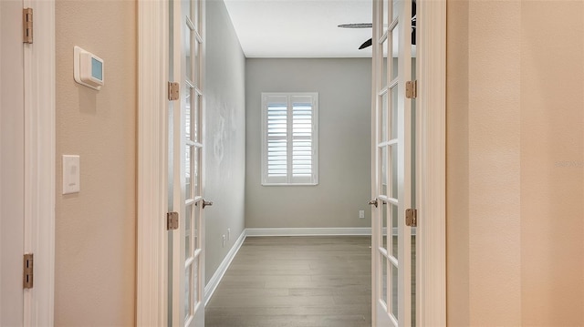 hallway featuring hardwood / wood-style floors