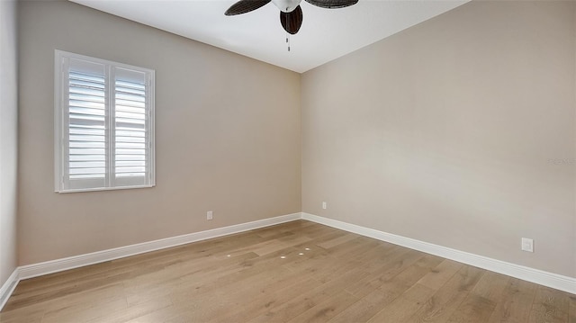 spare room with ceiling fan and light hardwood / wood-style floors