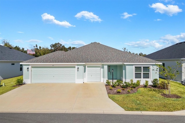 single story home with a garage and a front lawn