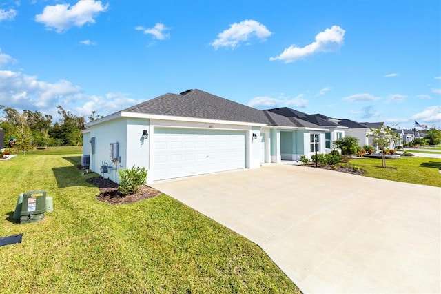 ranch-style house with a garage and a front lawn