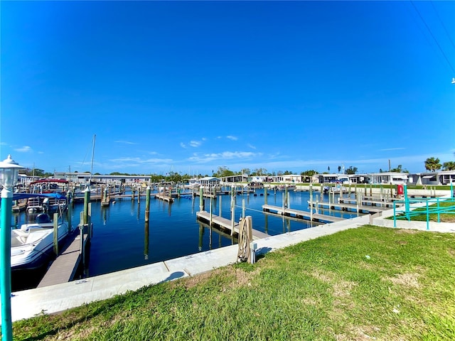 dock area featuring a water view