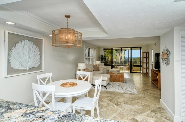 dining area with crown molding