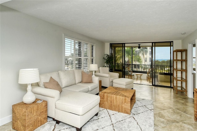 living room with a textured ceiling