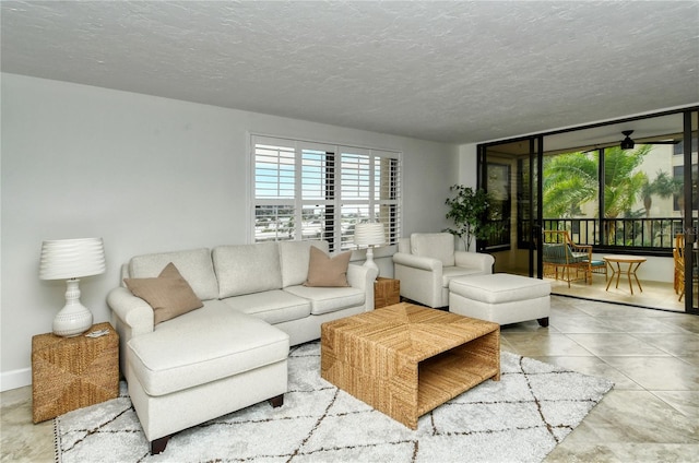 tiled living room with a textured ceiling