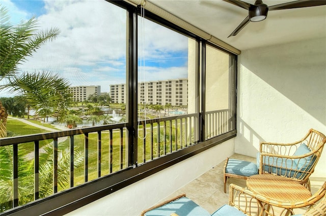 balcony featuring ceiling fan