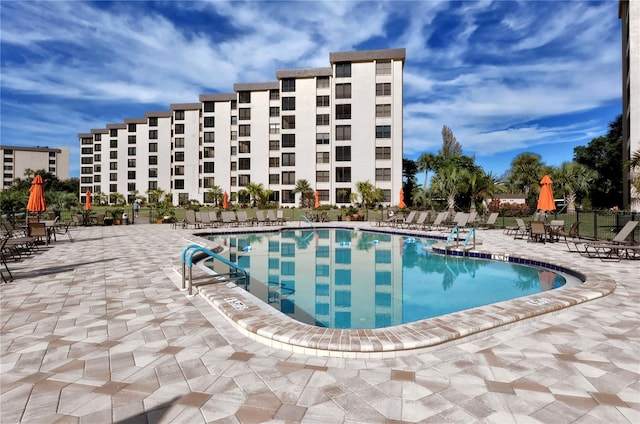 view of pool featuring a patio area