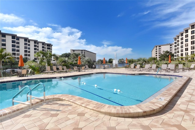 view of pool featuring a patio