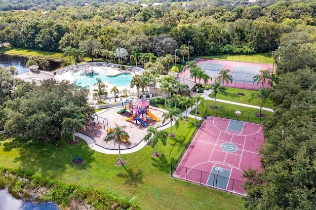 birds eye view of property with a water view