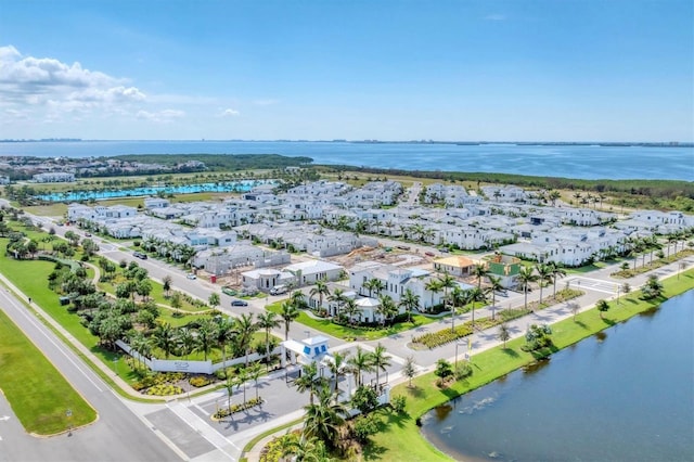 bird's eye view with a water view