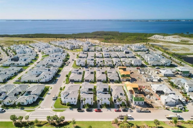 drone / aerial view featuring a water view