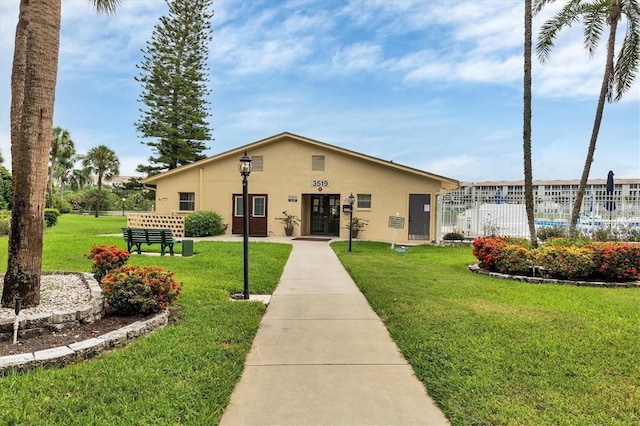 view of front of property with a front lawn