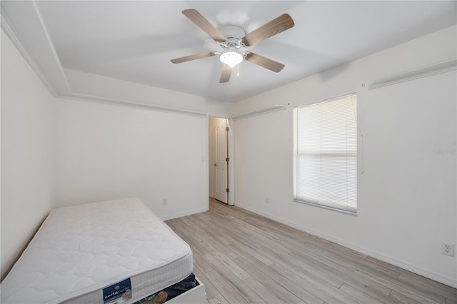 bedroom featuring ceiling fan and light wood-type flooring