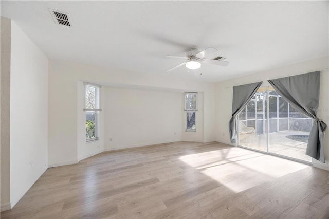 unfurnished room with ceiling fan and light wood-type flooring