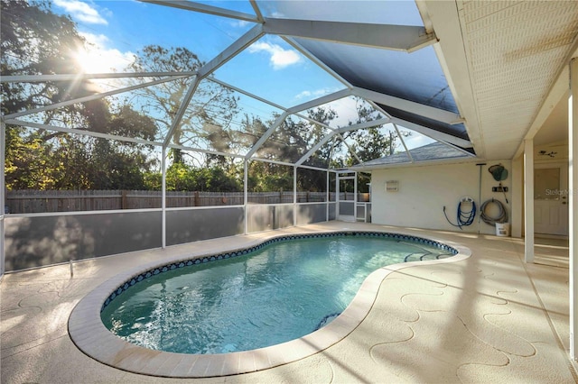 view of pool featuring a lanai and a patio area