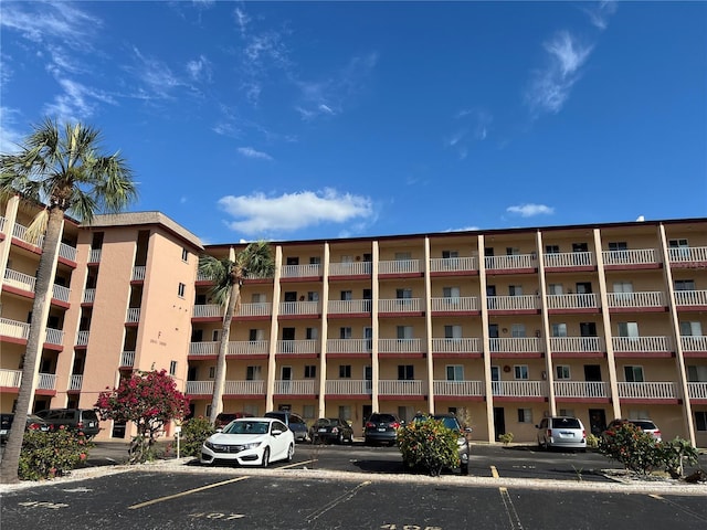3993 Lake Bayshore Dr Unit F513, Bradenton, FL 34205 - view of apartment building / complex with uncovered parking
