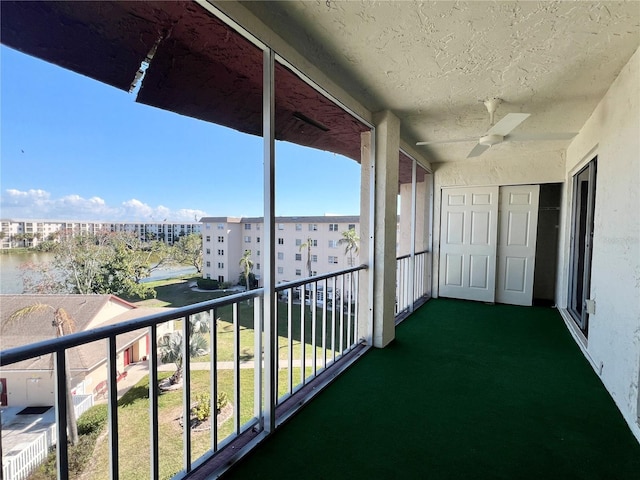 balcony featuring ceiling fan