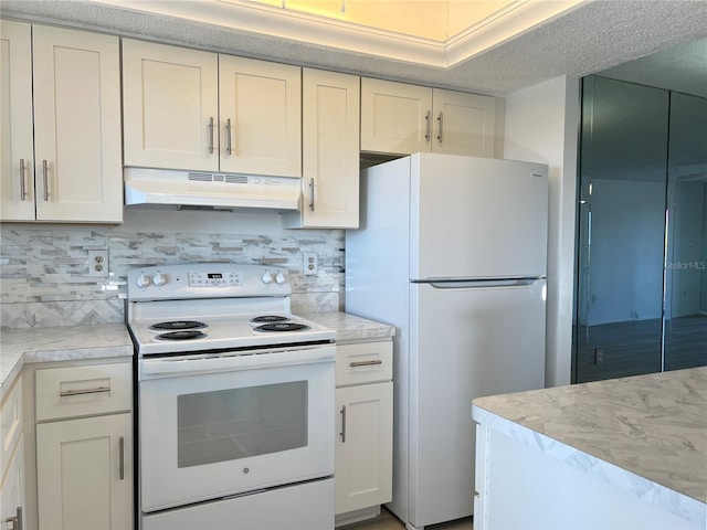 kitchen featuring white cabinetry, white appliances, light stone countertops, and decorative backsplash