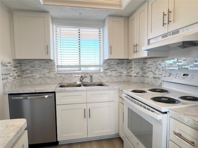 kitchen featuring white cabinetry, sink, stainless steel dishwasher, and electric range