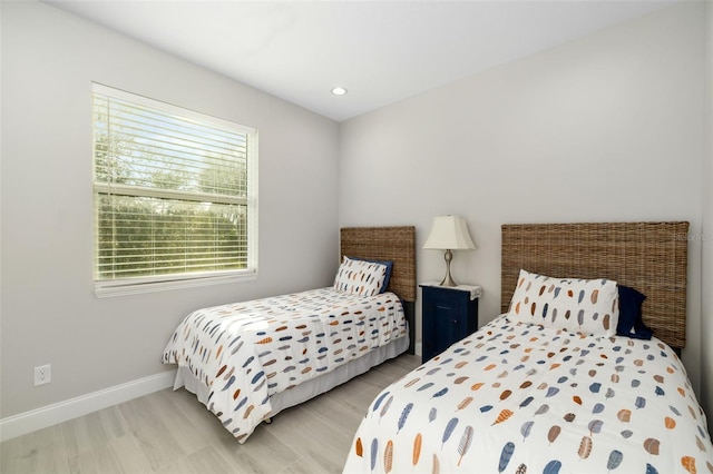 bedroom featuring light wood-type flooring