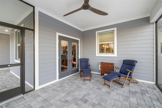 view of patio with ceiling fan and french doors