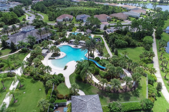 birds eye view of property featuring a water view