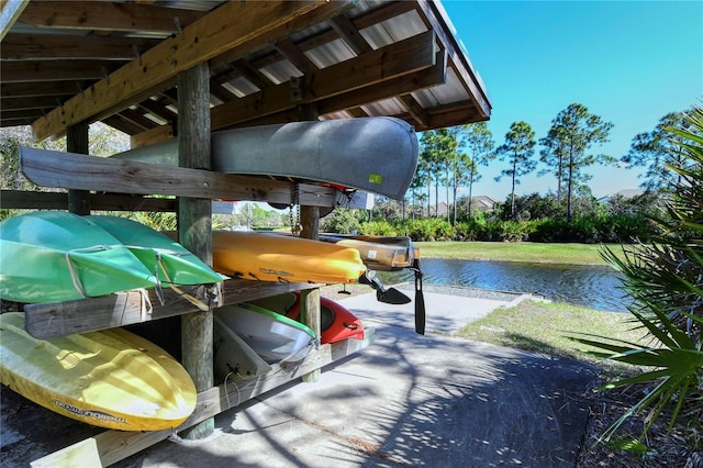 dock area with a water view