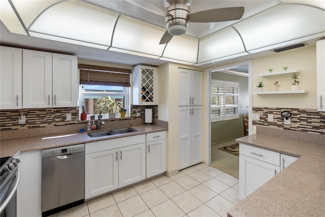 kitchen featuring white cabinetry, plenty of natural light, and stainless steel appliances