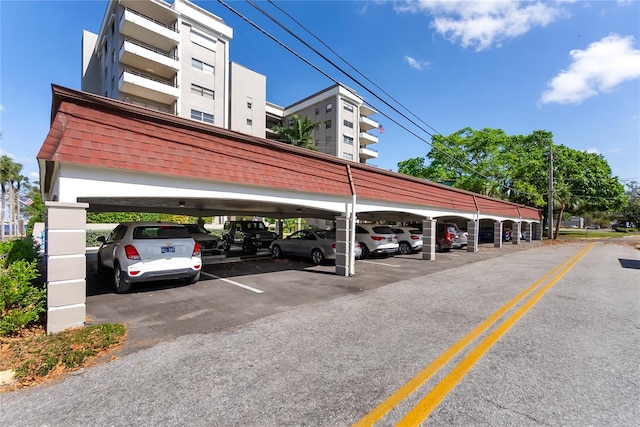 view of car parking featuring a carport