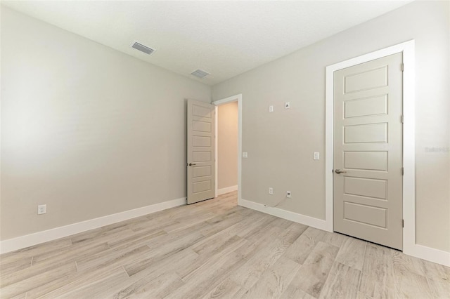 unfurnished bedroom with light hardwood / wood-style flooring