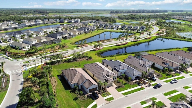 drone / aerial view with a water view