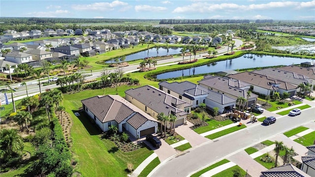 bird's eye view with a water view