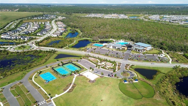 birds eye view of property featuring a water view