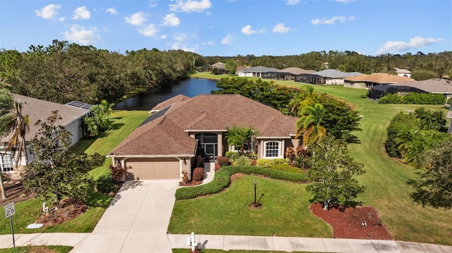 birds eye view of property featuring a water view