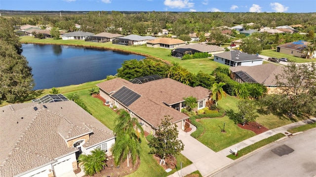 drone / aerial view with a water view