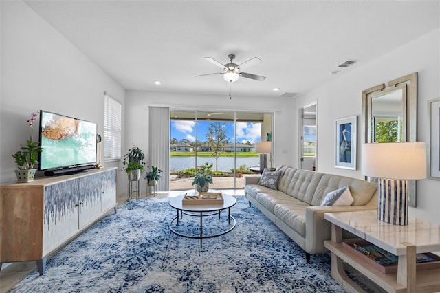 living room featuring ceiling fan