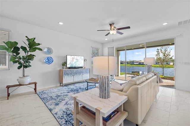 living room featuring ceiling fan