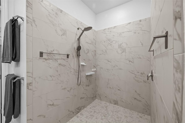 bathroom featuring tiled shower