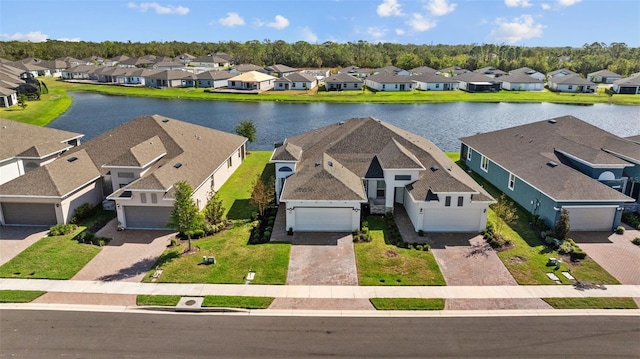 drone / aerial view featuring a water view