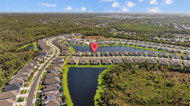 bird's eye view with a water view