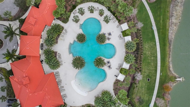 birds eye view of property featuring a water view